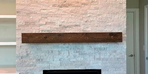 Отделка фасада камина из каменной 3D панели RKS SLATE Кварцит White Quartz Classic фото готового камина (7)